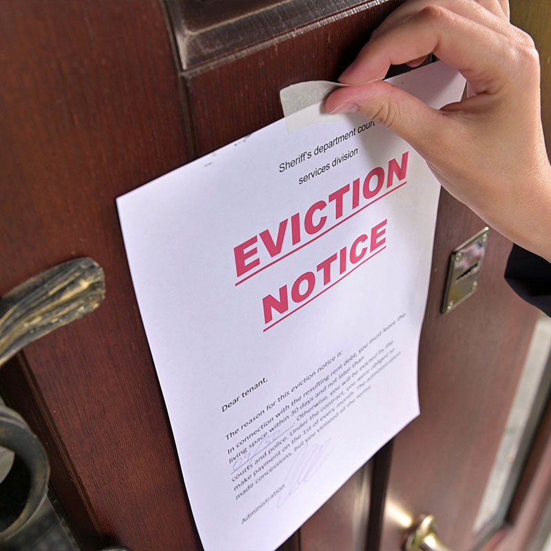 eviction notice taped to the door of a home